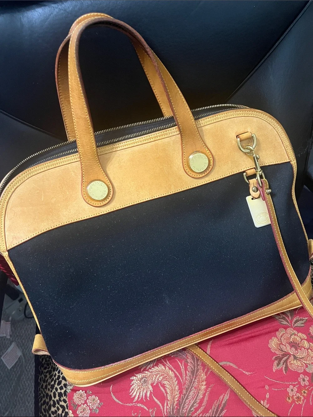 Dooney & Bourke Black and Tan Satchel with Gold Hardware